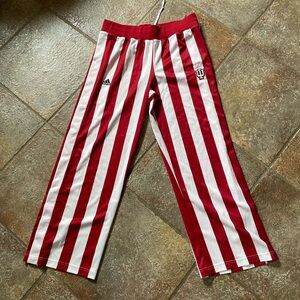 Original adidas Red and White Striped IU side snap sweat pants.